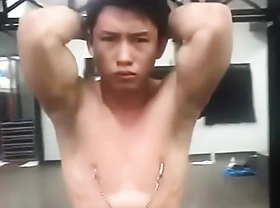 Asian young man indonesia manly nipple clamp to pain